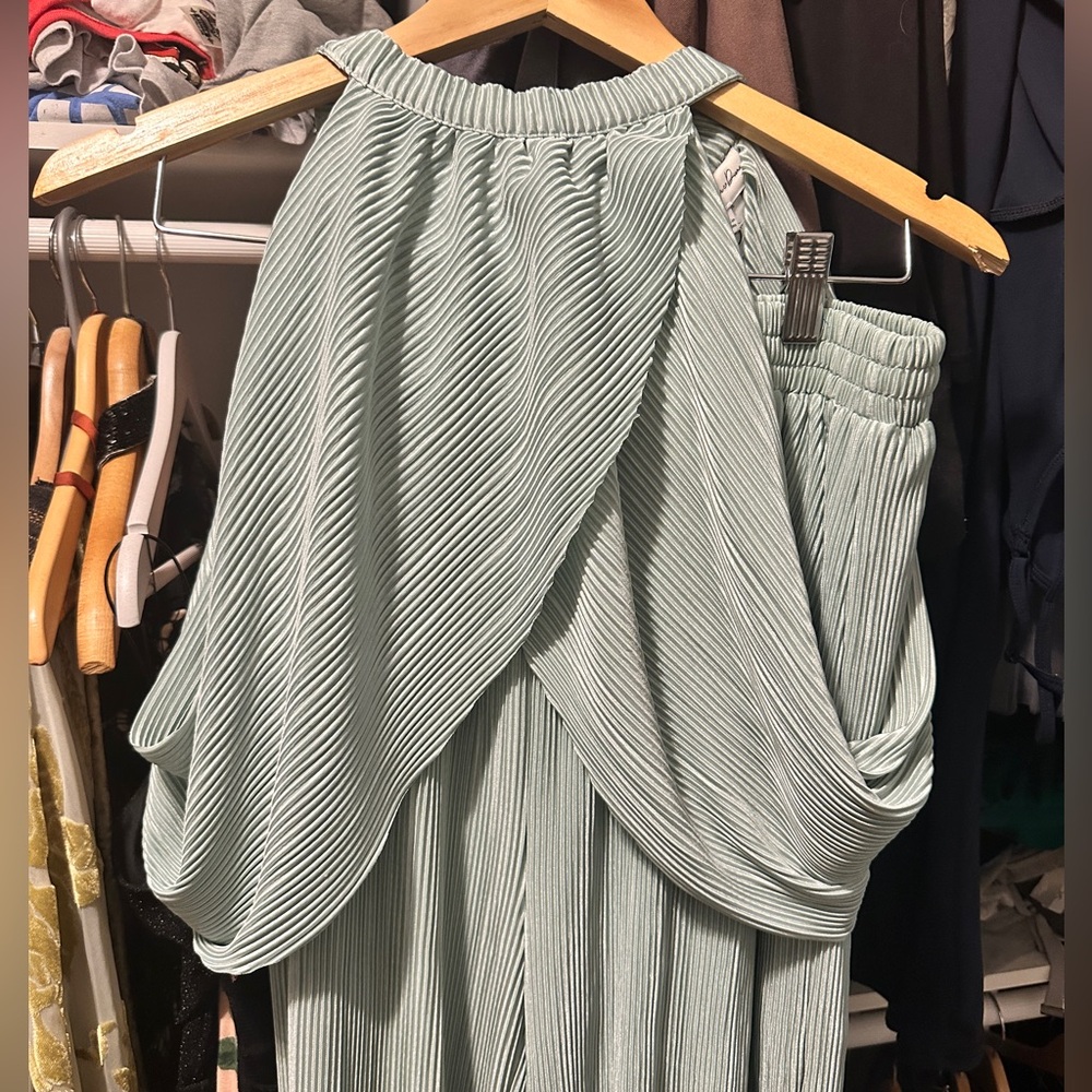Brand new never worn size small top/bottom